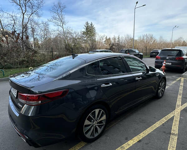 Сірий Кіа Оптіма, об'ємом двигуна 2 л та пробігом 142 тис. км за 10800 $, фото 1 на Automoto.ua