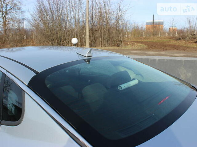 Серый Киа Оптима, объемом двигателя 2.4 л и пробегом 128 тыс. км за 11950 $, фото 92 на Automoto.ua