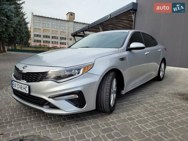 Серый Киа Оптима, объемом двигателя 2.36 л и пробегом 157 тыс. км за 10700 $, фото 2 на Automoto.ua