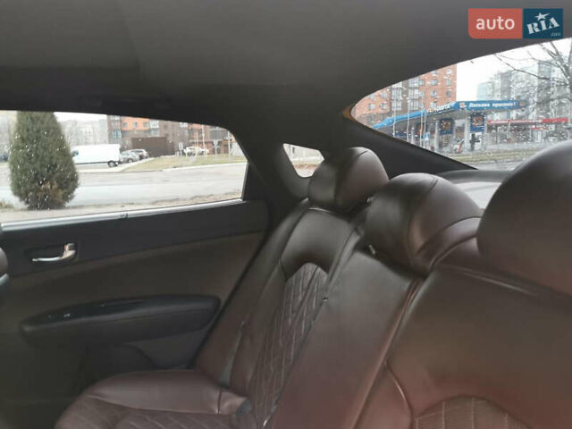 Сірий Кіа Оптіма, об'ємом двигуна 2 л та пробігом 100 тис. км за 13200 $, фото 6 на Automoto.ua