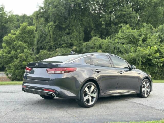 Серый Киа Оптима, объемом двигателя 2 л и пробегом 32 тыс. км за 9600 $, фото 4 на Automoto.ua