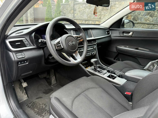 Сірий Кіа Оптіма, об'ємом двигуна 2.36 л та пробігом 150 тис. км за 13500 $, фото 11 на Automoto.ua