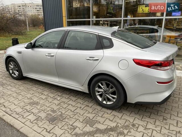 Сірий Кіа Оптіма, об'ємом двигуна 2.36 л та пробігом 117 тис. км за 13500 $, фото 1 на Automoto.ua