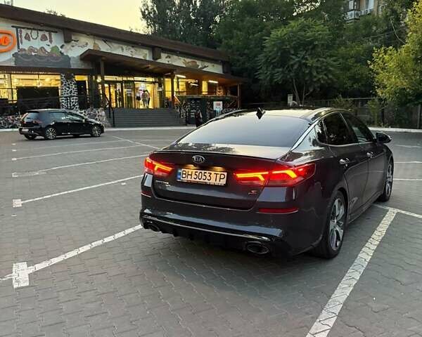 Серый Киа Оптима, объемом двигателя 2.36 л и пробегом 180 тыс. км за 15990 $, фото 4 на Automoto.ua