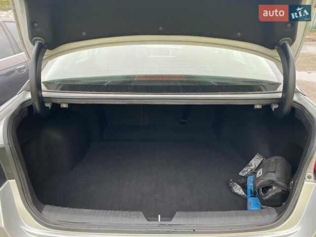 Сірий Кіа Оптіма, об'ємом двигуна 2.36 л та пробігом 117 тис. км за 13500 $, фото 7 на Automoto.ua