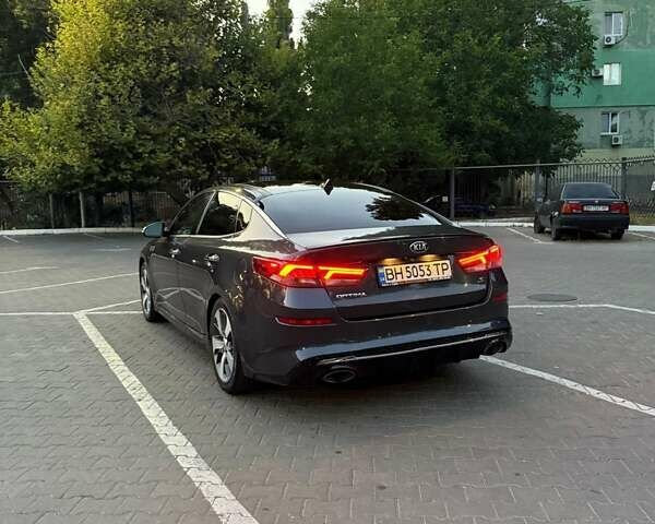 Серый Киа Оптима, объемом двигателя 2.36 л и пробегом 180 тыс. км за 15990 $, фото 5 на Automoto.ua