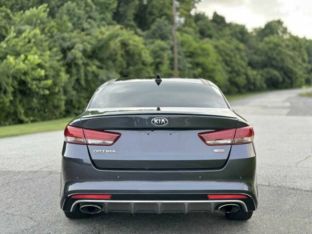 Серый Киа Оптима, объемом двигателя 2 л и пробегом 32 тыс. км за 9600 $, фото 5 на Automoto.ua