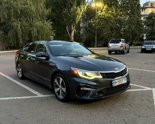 Серый Киа Оптима, объемом двигателя 2.36 л и пробегом 180 тыс. км за 15990 $, фото 6 на Automoto.ua