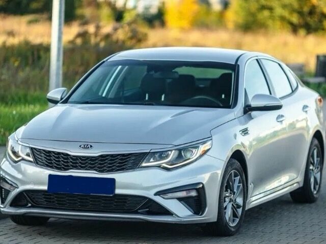 Серый Киа Оптима, объемом двигателя 2 л и пробегом 125 тыс. км за 9800 $, фото 5 на Automoto.ua