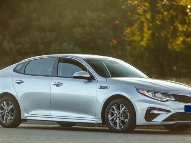 Серый Киа Оптима, объемом двигателя 2 л и пробегом 125 тыс. км за 9800 $, фото 1 на Automoto.ua