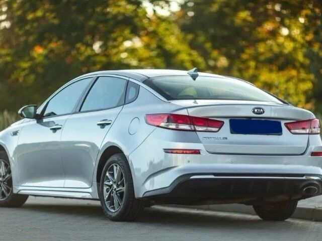 Серый Киа Оптима, объемом двигателя 2 л и пробегом 125 тыс. км за 9800 $, фото 2 на Automoto.ua