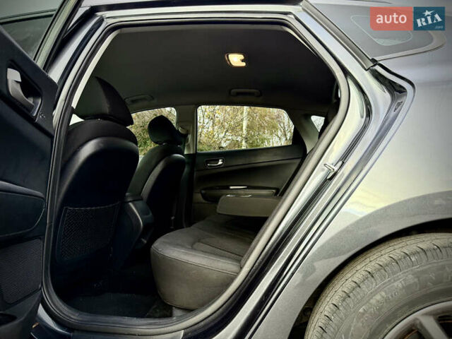 Сірий Кіа Оптіма, об'ємом двигуна 2.36 л та пробігом 185 тис. км за 14700 $, фото 25 на Automoto.ua