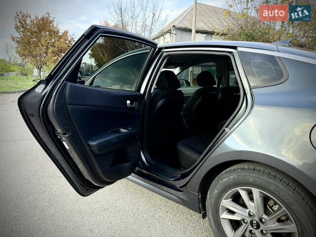 Сірий Кіа Оптіма, об'ємом двигуна 2.36 л та пробігом 185 тис. км за 14700 $, фото 24 на Automoto.ua