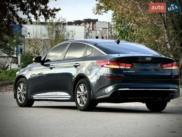 Сірий Кіа Оптіма, об'ємом двигуна 2.36 л та пробігом 185 тис. км за 14700 $, фото 9 на Automoto.ua