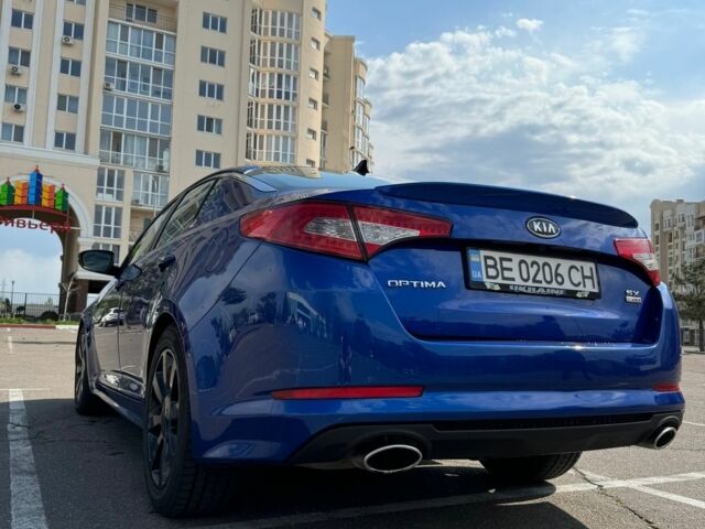 Синий Киа Оптима, объемом двигателя 2 л и пробегом 260 тыс. км за 9800 $, фото 14 на Automoto.ua
