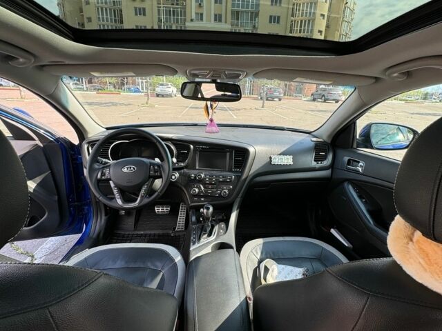 Синий Киа Оптима, объемом двигателя 2 л и пробегом 260 тыс. км за 9800 $, фото 10 на Automoto.ua