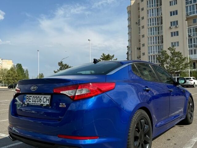 Синий Киа Оптима, объемом двигателя 2 л и пробегом 260 тыс. км за 9800 $, фото 2 на Automoto.ua