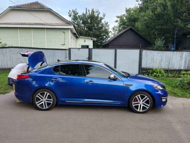 Синий Киа Оптима, объемом двигателя 2 л и пробегом 230 тыс. км за 14000 $, фото 2 на Automoto.ua