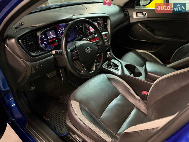 Синий Киа Оптима, объемом двигателя 2 л и пробегом 300 тыс. км за 8400 $, фото 7 на Automoto.ua