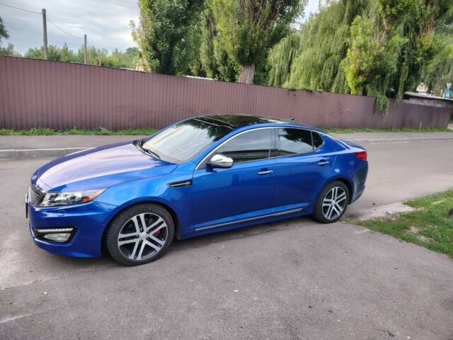 Синий Киа Оптима, объемом двигателя 2 л и пробегом 230 тыс. км за 14000 $, фото 5 на Automoto.ua