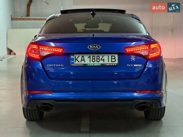 Синий Киа Оптима, объемом двигателя 2 л и пробегом 300 тыс. км за 8400 $, фото 1 на Automoto.ua