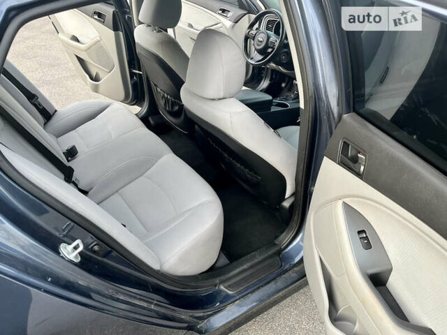 Синий Киа Оптима, объемом двигателя 2.4 л и пробегом 260 тыс. км за 9700 $, фото 16 на Automoto.ua