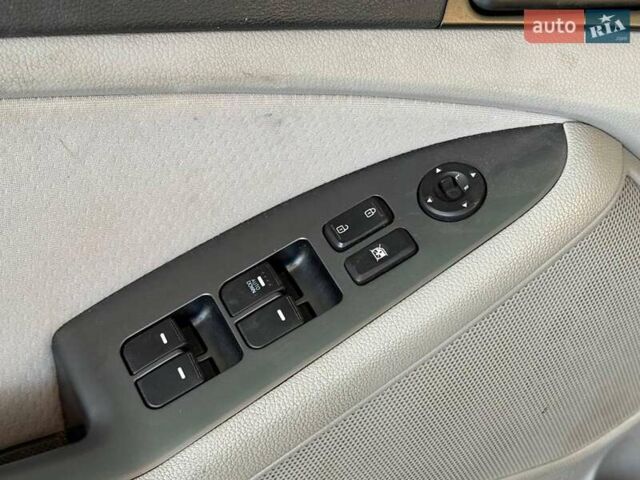 Синій Кіа Оптіма, об'ємом двигуна 2.4 л та пробігом 207 тис. км за 10490 $, фото 10 на Automoto.ua