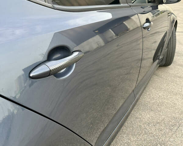 Синий Киа Оптима, объемом двигателя 2.4 л и пробегом 260 тыс. км за 9700 $, фото 24 на Automoto.ua