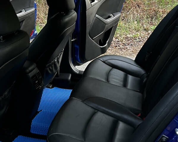 Синий Киа Оптима, объемом двигателя 2.36 л и пробегом 236 тыс. км за 10600 $, фото 9 на Automoto.ua