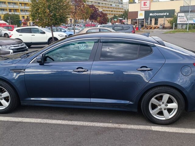 Синий Киа Оптима, объемом двигателя 2 л и пробегом 162 тыс. км за 8000 $, фото 1 на Automoto.ua