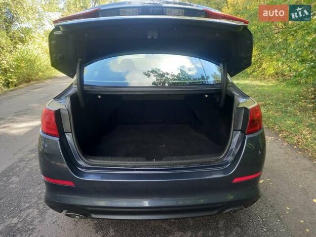 Синій Кіа Оптіма, об'ємом двигуна 2.36 л та пробігом 135 тис. км за 9800 $, фото 23 на Automoto.ua