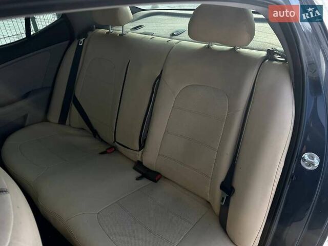 Синій Кіа Оптіма, об'ємом двигуна 2.36 л та пробігом 199 тис. км за 9800 $, фото 9 на Automoto.ua