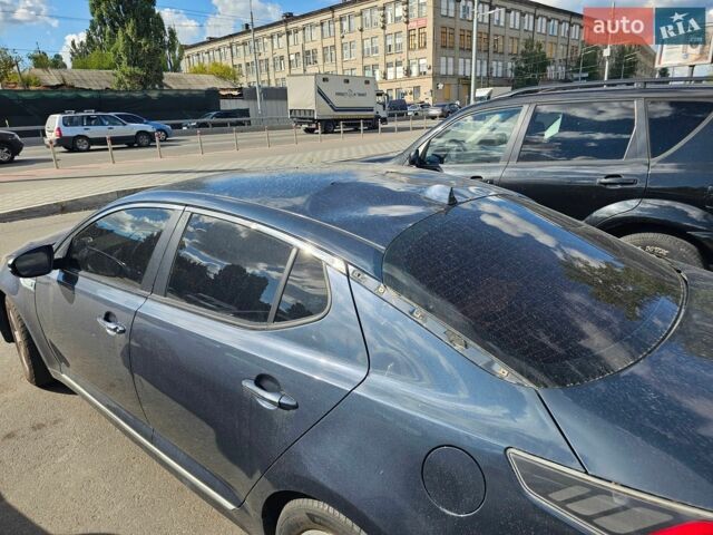 Синий Киа Оптима, объемом двигателя 2.36 л и пробегом 204 тыс. км за 5600 $, фото 1 на Automoto.ua