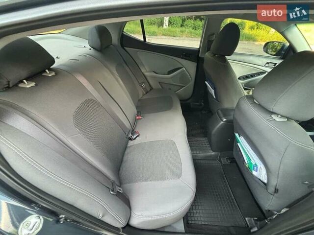 Синий Киа Оптима, объемом двигателя 2.4 л и пробегом 226 тыс. км за 9750 $, фото 8 на Automoto.ua