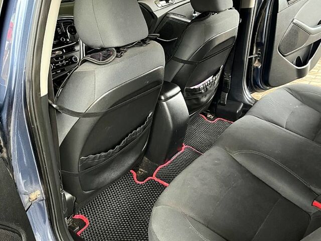 Синий Киа Оптима, объемом двигателя 2.4 л и пробегом 220 тыс. км за 9200 $, фото 9 на Automoto.ua