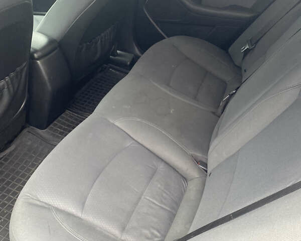 Синий Киа Оптима, объемом двигателя 2.4 л и пробегом 273 тыс. км за 6900 $, фото 6 на Automoto.ua