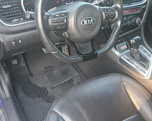 Синий Киа Оптима, объемом двигателя 2 л и пробегом 165 тыс. км за 12900 $, фото 3 на Automoto.ua