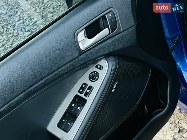 Синий Киа Оптима, объемом двигателя 2 л и пробегом 202 тыс. км за 11500 $, фото 13 на Automoto.ua