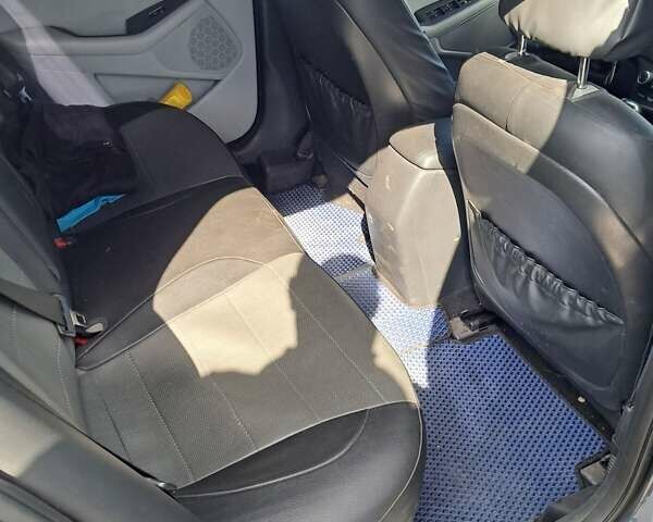 Синий Киа Оптима, объемом двигателя 2.4 л и пробегом 150 тыс. км за 8700 $, фото 5 на Automoto.ua