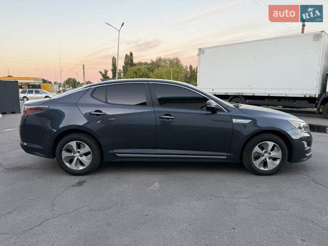 Синій Кіа Оптіма, об'ємом двигуна 2.4 л та пробігом 167 тис. км за 9900 $, фото 2 на Automoto.ua