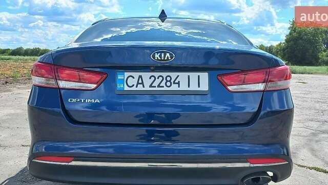 Синий Киа Оптима, объемом двигателя 2.4 л и пробегом 144 тыс. км за 14000 $, фото 19 на Automoto.ua