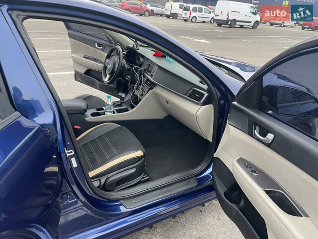 Синий Киа Оптима, объемом двигателя 2.4 л и пробегом 148 тыс. км за 11500 $, фото 12 на Automoto.ua