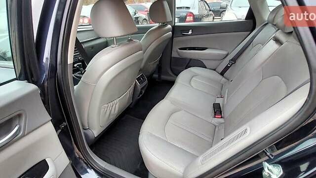 Синій Кіа Оптіма, об'ємом двигуна 2 л та пробігом 56 тис. км за 17950 $, фото 4 на Automoto.ua