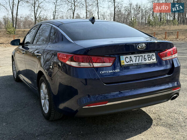Синий Киа Оптима, объемом двигателя 2.4 л и пробегом 149 тыс. км за 11200 $, фото 4 на Automoto.ua