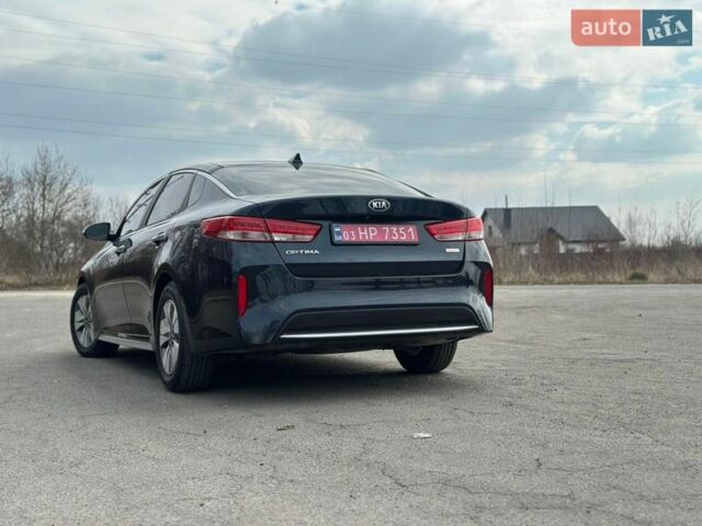 Синій Кіа Оптіма, об'ємом двигуна 2 л та пробігом 234 тис. км за 12900 $, фото 8 на Automoto.ua