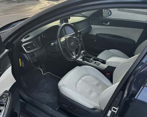 Синій Кіа Оптіма, об'ємом двигуна 2 л та пробігом 85 тис. км за 15500 $, фото 5 на Automoto.ua