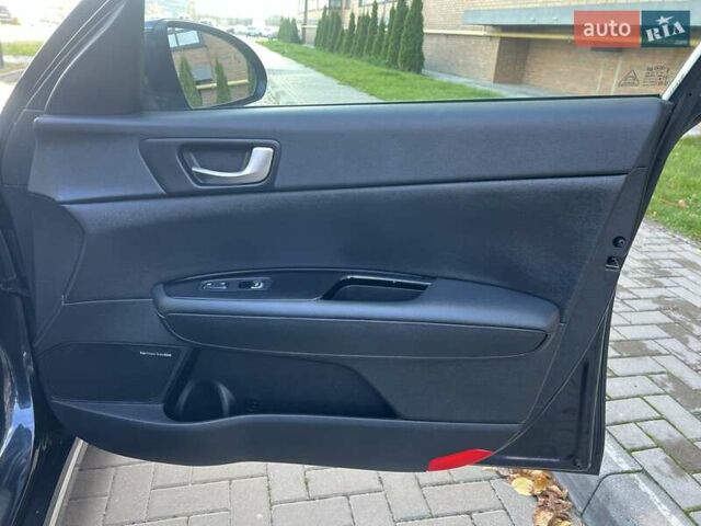 Синий Киа Оптима, объемом двигателя 1.7 л и пробегом 141 тыс. км за 14800 $, фото 7 на Automoto.ua