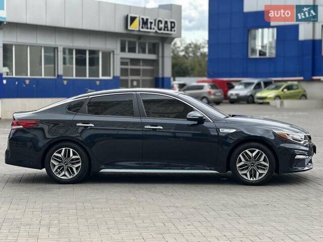 Синий Киа Оптима, объемом двигателя 2 л и пробегом 109 тыс. км за 19990 $, фото 3 на Automoto.ua