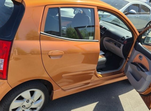 Бежевий Кіа Піканто, об'ємом двигуна 1 л та пробігом 128 тис. км за 4400 $, фото 4 на Automoto.ua