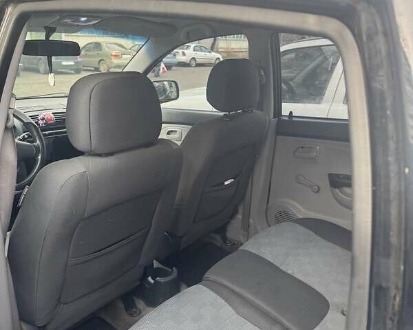 Чорний Кіа Піканто, об'ємом двигуна 1.09 л та пробігом 215 тис. км за 3850 $, фото 7 на Automoto.ua